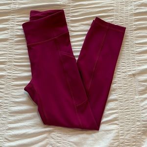 Pink Lululemon cropped leggings with pockets